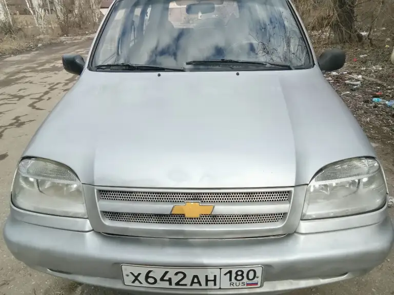 Продам шевроле нива 2003 г. , пробег - 200190км. Двигатель - норм. , коробка - норм. , документы в порядке. Установлено много нового. Цена - 250000 р. , возможен небольшой торг. +7949 306 67 86 - фотография - 2