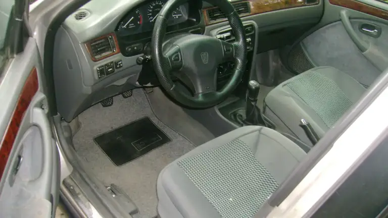 Rover 618i, 1996г. В. Серый металлик. Двиг.1,85л. F18a3 хонда аккорд,115 л. С. Резвый. Гур. Руля. Пробег 165тыс. Км. Мотор, коробка, вся подвеска и салонная начинка-хонда аккорд. Кондиционер, эл. Стёкла. Airbag 2 шт. Оригинальные. Японские тит. Диски, летняя резина dunlop 195х65хr15.доп. Комплект аммортизаторов koni sport c быстрой регул. Под капотом. Авто в хорошем состоянии, подвеска на отлично. За 10 лет эксплуатации ничего не менялось. Литовская регистрация и документы. Цена 120тыс. Руб. Тел. +79495384638 г. Донецк - фотография - 2
