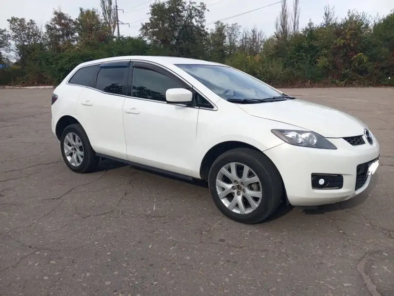 Продам mazda cx7 2007г. 2.3 бензин turbo, акпп автомат, полный привод, пробег 240т. В хорошем состоянии на свои года, но не новая! Двигатель, акпп в норме, подвеска перебрана. Авто комфортное и вместительное. Кож. Салон, мультируль, круиз-контроль, электро привод сидений, кондиционер, эл/стекла, зеркала, датчики света, дождя. Android отличный, звук, парктронник, камера зад. Вида, и т. Д. Документы в порядке. Цена низ рынка 580.000р. Нормальное авто за эти деньги, без глупых вопросов! Енакиево. +79493652755, миранда +79490366206. - фотография - 3