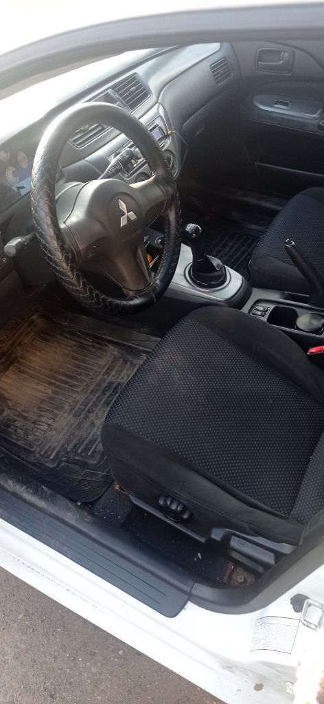 Продам митсубиси лансер 9 в хорошем состоянии. один хозяин. машина 2008 г. в. выехала из салона в 2011 году. в дтп не была, и не красилась, все стекла родные. пробег 154т. км мотор 1.6 16 кл. 98 л. с. кондиционер, 4 стеклоподъёмника, подогрев передних сидений, ел. зеркала, обогрев заднего стекла, гидроусилитель руля, ксенон. мотор в идеальном состоянии, коробка переключается как на новой машине. новые свечи, катушки, масло в двигателе, резина, акумулятор. гбо евро-4 вписано в техпаспорт. нужно заниматься арками задних крыльев! цена договорная. +79495240709 - фотография - 19