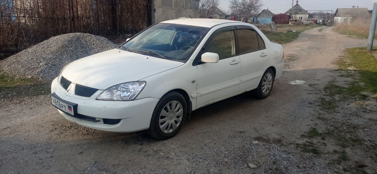 Продам митсубиси лансер 9 в хорошем состоянии. один хозяин. машина 2008 г. в. выехала из салона в 2011 году. в дтп не была, и не красилась, все стекла родные. пробег 154т. км мотор 1.6 16 кл. 98 л. с. кондиционер, 4 стеклоподъёмника, подогрев передних сидений, ел. зеркала, обогрев заднего стекла, гидроусилитель руля, ксенон. мотор в идеальном состоянии, коробка переключается как на новой машине. новые свечи, катушки, масло в двигателе, резина, акумулятор. гбо евро-4 вписано в техпаспорт. нужно заниматься арками задних крыльев! цена договорная. +79495240709 - фотография - 2