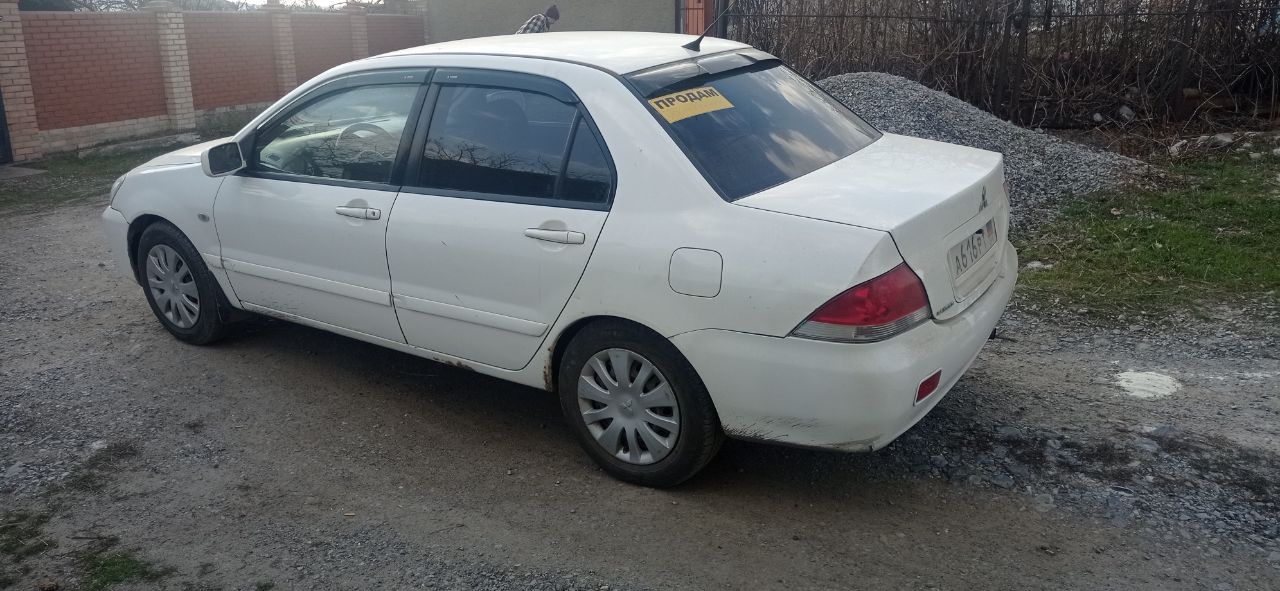 Продам митсубиси лансер 9 в хорошем состоянии. один хозяин. машина 2008 г. в. выехала из салона в 2011 году. в дтп не была, и не красилась, все стекла родные. пробег 154т. км мотор 1.6 16 кл. 98 л. с. кондиционер, 4 стеклоподъёмника, подогрев передних сидений, ел. зеркала, обогрев заднего стекла, гидроусилитель руля, ксенон. мотор в идеальном состоянии, коробка переключается как на новой машине. новые свечи, катушки, масло в двигателе, резина, акумулятор. гбо евро-4 вписано в техпаспорт. нужно заниматься арками задних крыльев! цена договорная. +79495240709 - фотография - 3