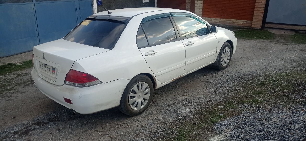 Продам митсубиси лансер 9 в хорошем состоянии. один хозяин. машина 2008 г. в. выехала из салона в 2011 году. в дтп не была, и не красилась, все стекла родные. пробег 154т. км мотор 1.6 16 кл. 98 л. с. кондиционер, 4 стеклоподъёмника, подогрев передних сидений, ел. зеркала, обогрев заднего стекла, гидроусилитель руля, ксенон. мотор в идеальном состоянии, коробка переключается как на новой машине. новые свечи, катушки, масло в двигателе, резина, акумулятор. гбо евро-4 вписано в техпаспорт. нужно заниматься арками задних крыльев! цена договорная. +79495240709 - фотография - 5