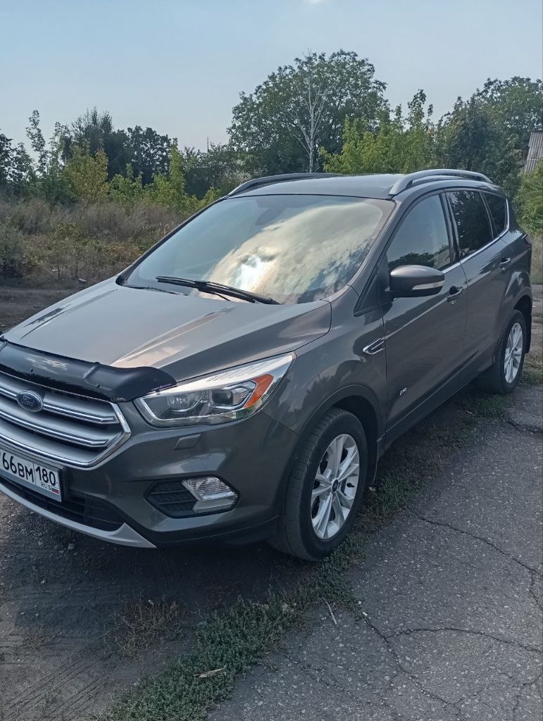 Продам автомобиль ford cuga 2016 года выпуска. тип двигателя- турбо дизель, 2л. , 163л. с.. полноприводный, автомат. усилитель руля- электрический. двухзонный климат контроль. салон комбинированный. обогрев передних сидений, зеркал, задних зеркал и руля. электропривод передних сидений, зеркал, складывание зеркал. датчик дождя, света, партроник задний, камера заднего вида, круиз контроль, бортовой компьютер. пробег родной 155 000,00 км. я второй хозяин. цена 1.250.000 возможен небольшой торг при встрече. +79494475706 - фотография - 4
