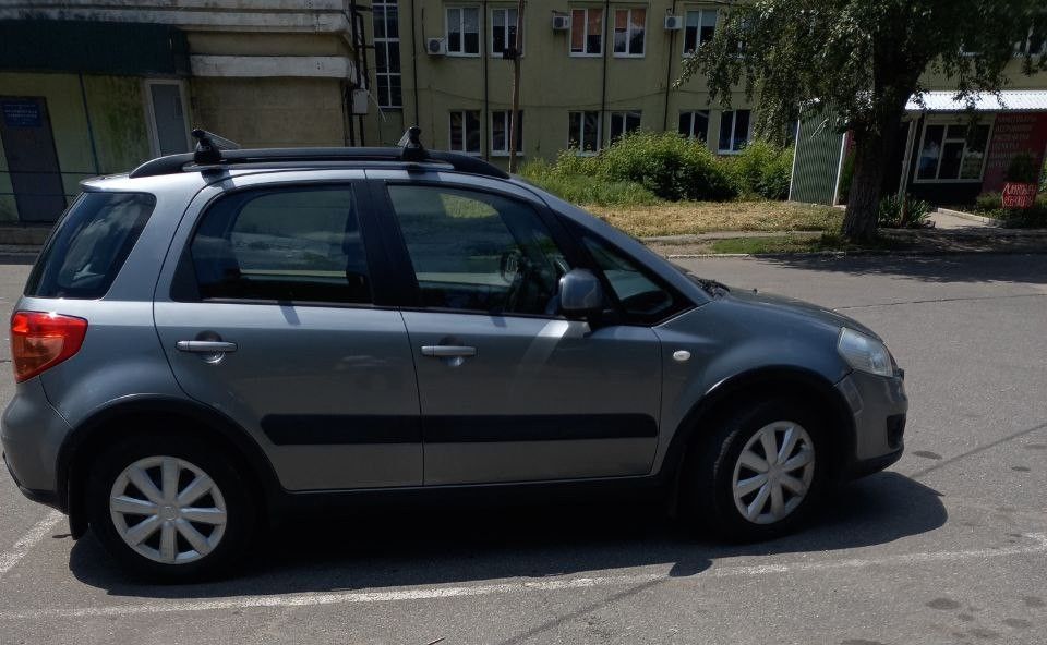 Продам suzuki sx4 1.6 at (автомат), 2011 г. в. цена: 950,000 руб. местонахождение: донецк основные характеристики: год выпуска: 2011 двигатель: бензиновый, объем 1.6 л коробка передач: автоматическая пробег: 187,000 км привод: передний преимущества: один хозяин, бережная эксплуатация не использовалась в такси чистый и ухоженный салон родной пробег, без скручивания установлено качественное газовое оборудование полный комплект ключей и документов регулярное обслуживание, все заменено вовремя контакты: звоните: +7 949 405 42 97 telegram: +380 71 405 42 97 автомобиль находится в донецке. готов к осмотру, звоните или пишите для уточнения деталей! - фотография - 3