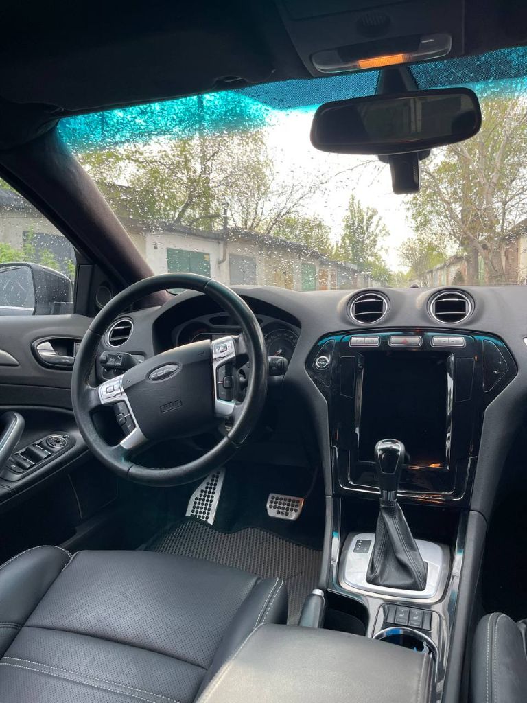 Продам ford mondeo iv(форд мондео 4) 2008г 2.0 турбо дизель на акпп, 143л. с. пробег 277т. км. расход 5-7л на 100км. на жирной комплектации: бесключевой доступ, бесключевой запуск адаптивный линзовый авто свет, с подсветкой поворотов, авто дождь салон комбинированный кожа-алькантара подогрев переднего, заднего ряда fordconvers+ круиз-контроль помощь при трогании в гору, при парковке, перед, зад парктроники, камера заднего вида, сигнал при приблежение к спереди идущему авто акпп с ручным управление и режимом спорт потолок и стойки перетянуты в черный замш установлен тесла монитор с хорошей музыкой, сим картой и навигацией. из заводских домов металлические накладки на педалях, подсветка ног. возможно что-то забыл, можно узнать полную комплектацию по вин. посмотреть можно донецк, макеевка, харцызск по договоренности. цена 830т. р. тел +79495800905 - фотография - 6