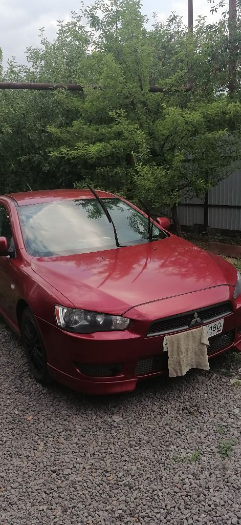 Mitsubishi lancer 2.0 mt, 2008 г. в., 216 298 км. пробега, полный привод с завода, работает без наре... - фотография