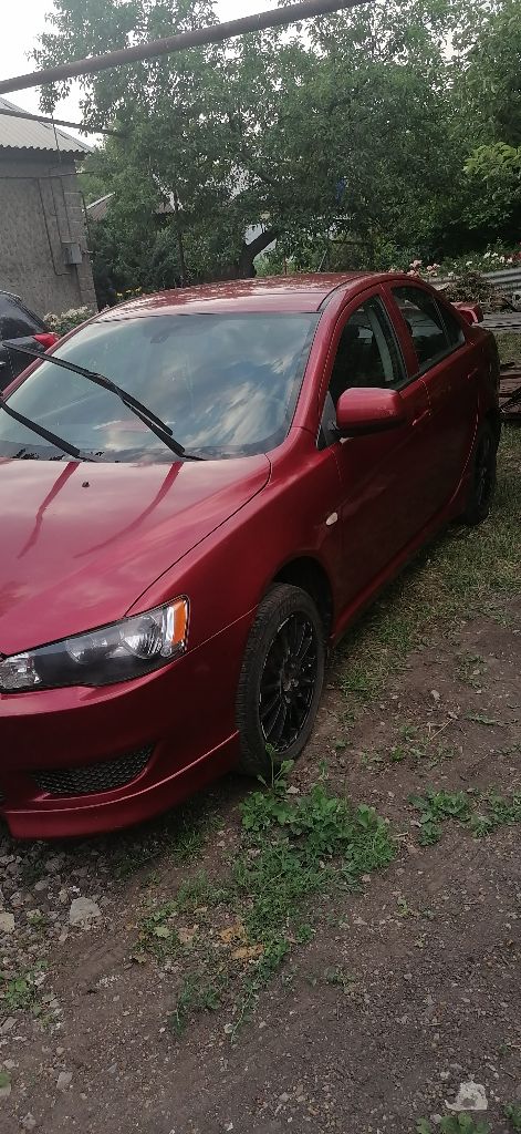 Mitsubishi lancer 2.0 mt, 2008 г. в., 216 298 км. пробега, полный привод с завода, работает без нареканий. редкий полноприводный автомобиль. датчик дождя, света, подогрев передних сидений, штатная магнитола, круиз контроль. двигатель и коробка в хорошем состоянии, косметички имеются сколы на пластике, (3 года назад автомобиль освежался). ходовая часть исправна. цена 650.000 р, . тел. +7949-422-97-28. - фотография - 2