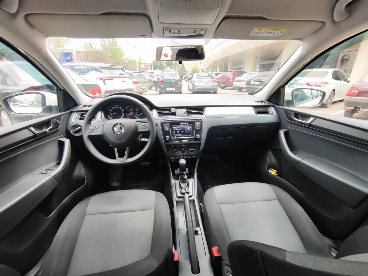 Автомобиль: skoda rapid, год 2019, пробег 56 000км, объем 1600см, цена 1 370 000, телефон +7 949 844-60-64, дмитрий. местонахождение донецк продаю свой ухоженный и энергичный skoda rapid 2019 года выпуска в редкой и стильной комплектации hockey edition! это не просто надежный чешский хэтчбек – это автомобиль с характером, готовый подарить вам комфорт и уверенность за рулем каждый день! почему этот rapid – умная покупка сегодня? ✅ уникальный hockey edition: выделяйтесь из потока! черные элементы экстерьера (зеркала, радиаторная решетка), стильные 16" литые диски, спортивный руль, подогрев передних сидений и лобового стекла – все это делает авто не только красивым, но и невероятно практичным для нашего климата! ✅ свежее обслуживание – ездите без забот! всего 500 км назад пройдено полное то! заменено: масло, все фильтры (воздушный, салонный, масляный, топливный), свечи зажигания! автомобиль технически идеально подготовлен для нового владельца – просто садитесь и езжайте! ✅ чистая история & документы: оригинал птс, всего 2 собственника, никаких залогов и ограничений! история без дтп. прозрачность и спокойствие гарантированы. все готово к быстрой и честной сделке! ✅ небольшой пробег: всего 56 000 км – автомобиль в самом расцвете сил! реальная экономия по сравнению с новым авто. ✅ автомат & экономия: плавная и надежная 6-ступенчатая автоматическая коробка передач (aq160) – идеал для города и трассы. комбинируйте с отличной топливной экономичностью (всего ~6.5-7.5 л/100км!). ✅ ухоженный салон: тканевый салон в хорошем состоянии – уютно, практично и без серьезных повреждений. огромный багажник (415 л) – возьмите все, что нужно! ✅ цена соответствует качеству: 1 370 000 руб. – это инвестиция в надежный, свежеобслуженный и уникальный автомобиль в топовой для rapid комплектации. сравните предложения – здесь вы платите за готовность и эксклюзивность! 🚗 hockey edition – для тех, кто ценит стиль и практичность! динамичный дизайн, отличная управляемость, подогревы для холодного утра, экономичный двигатель и акпп – идеальный набор для комфортной и уверенной езды по донецку и за его пределами. 💎 это не обычная продажа – это шанс получить особенный rapid! 💎 где смотреть? автомобиль находится в донецке. приглашаю на смотрины и тест-драйв в удобное время! проверка? приветствую адекватные проверки на подъемнике у вашего мастера (после осмотра). торг? возможен только при личной встрече для серьезного покупателя с готовностью к сделке. - фотография - 7