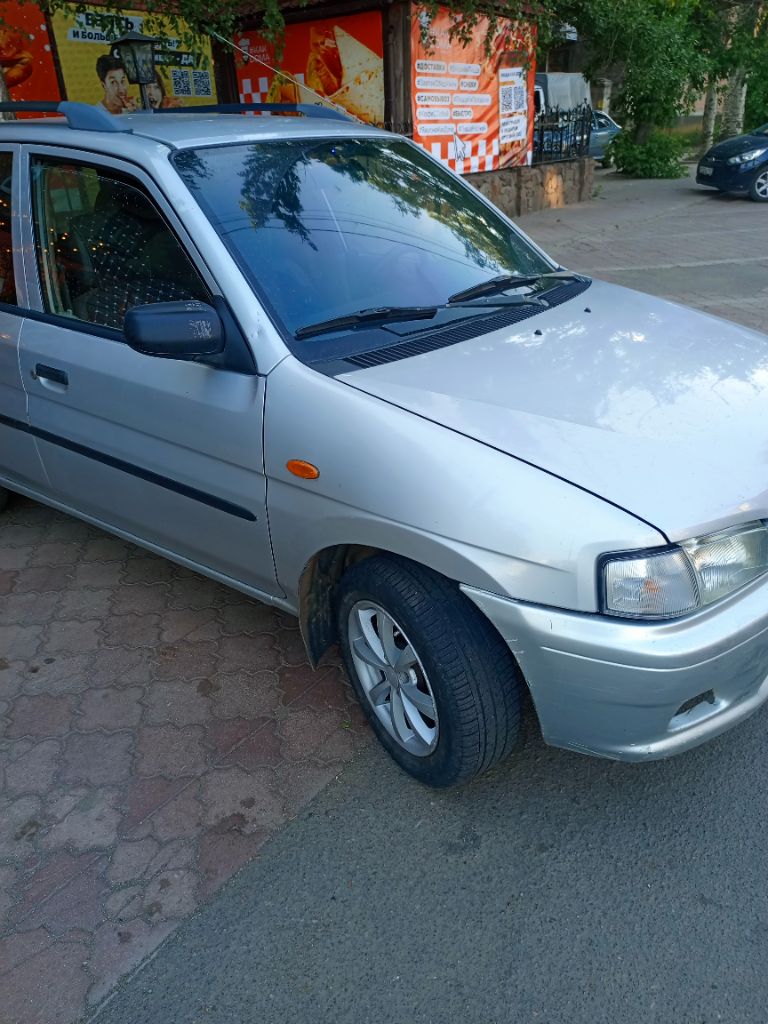 Мазда демио 1999 год. торг. сигнализация, стеклоподъёмники, зимняя резина. гаражное хранение. собств... - фотография
