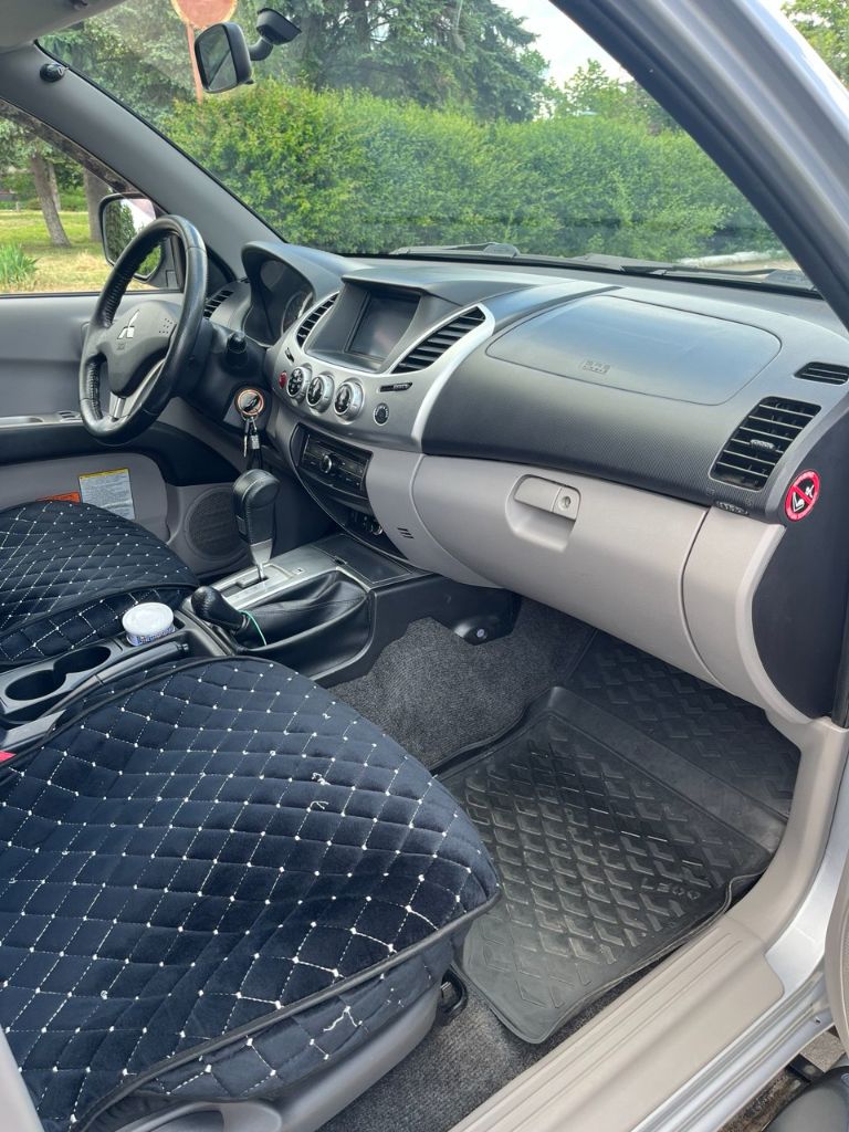 Mitsubishi l200, 2013 года выпуска, рестайлинг.2,5 дизель, автомат, раздатка super select пробег 136 тысячи километров в отличном состоянии, алюминиевая защита днища, турбо таймер к авто прилагается кунг, и зимняя резина на дисках. 2,2 млн, территориально г. красный луч(хрустальный) т. +79591088833 - фотография - 5