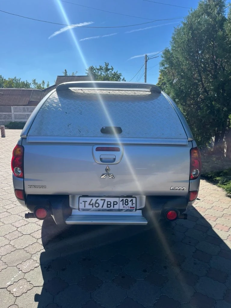 Mitsubishi l200, 2013 года выпуска, рестайлинг.2,5 дизель, автомат, раздатка super select пробег 136 тысячи километров в отличном состоянии, алюминиевая защита днища, турбо таймер к авто прилагается кунг, и зимняя резина на дисках. 2,2 млн, территориально г. красный луч(хрустальный) т. +79591088833 - фотография - 12