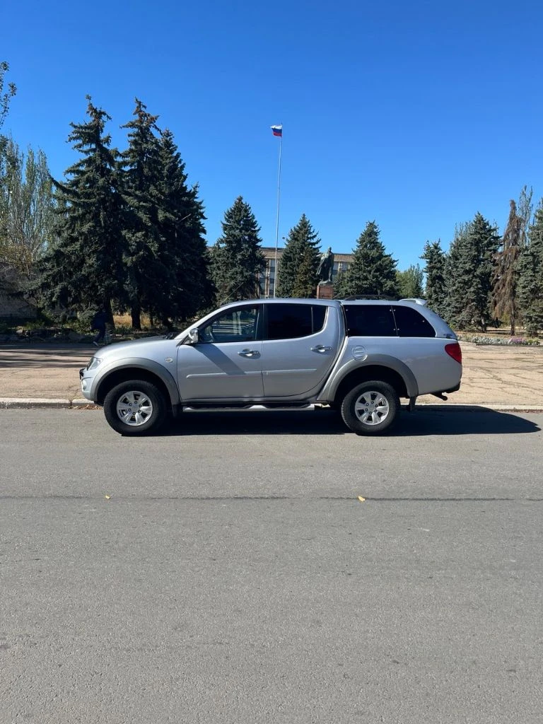 Mitsubishi l200, 2013 года выпуска, рестайлинг.2,5 дизель, автомат, раздатка super select пробег 136 тысячи километров в отличном состоянии, алюминиевая защита днища, турбо таймер к авто прилагается кунг, и зимняя резина на дисках. 2,2 млн, территориально г. красный луч(хрустальный) т. +79591088833 - фотография - 14