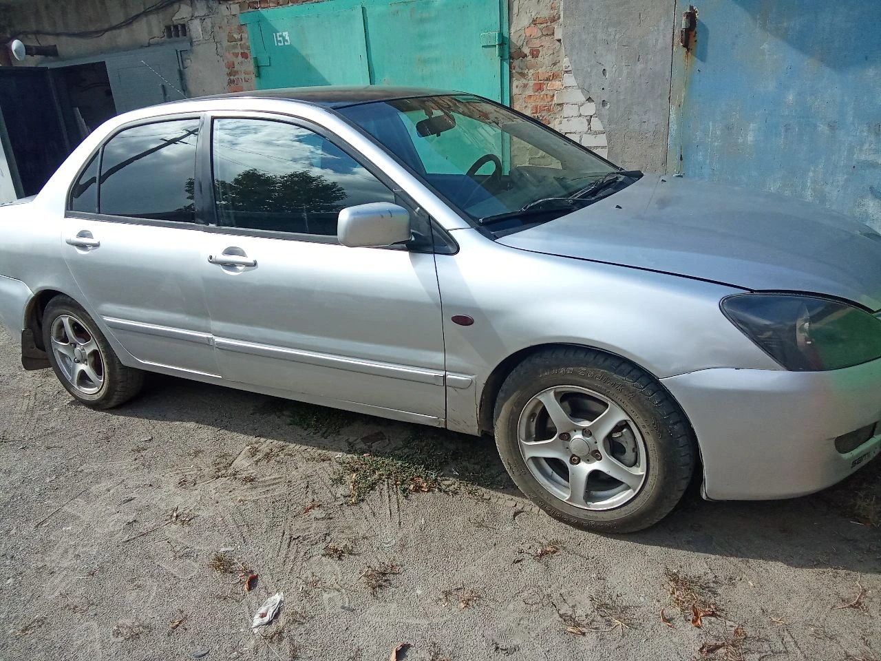 Продам мицубиси лансер 2004года цена 400 тыс. автомобиль технические в хорошем состоянии двигатель 1... - фотография