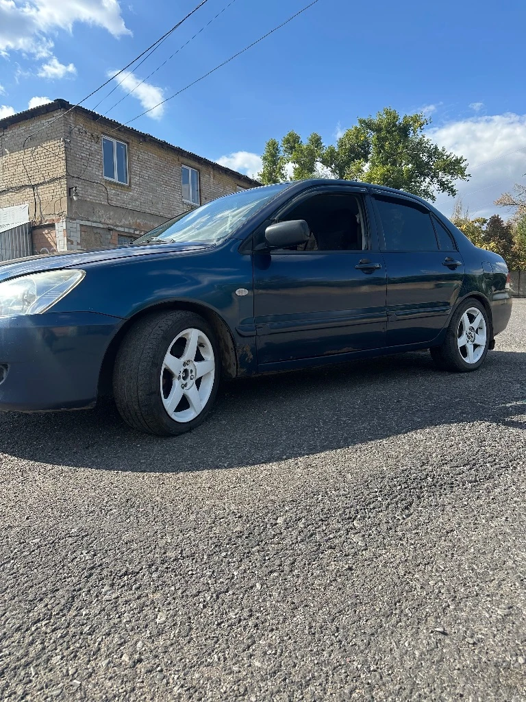 Продам лансер 9, 2005г, в нормальном состоянии для этой цены, все подробности по телефону или в лс +79493709586, цена 270.000р, донецк - фотография - 2