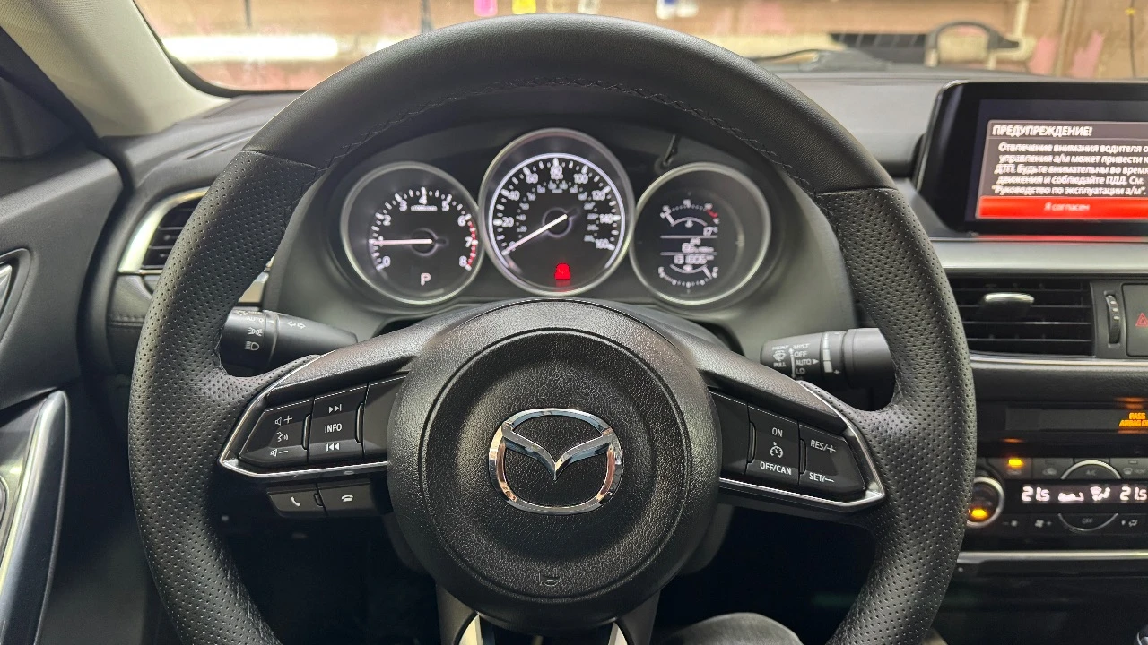 Mazda 6, 2017 — для тех, кто любит драйв и стиль! цена 1 890 000 руб. +79493329833 денис авто в донецке эта mazda 6 создана, чтобы дарить эмоции от каждой поездки. надёжный атмосферный двигатель 2.5 (186 л. с.) в паре с автоматом делает вождение лёгким и уверенным. машина отзывчивая, динамичная и при этом экономичная — идеальный баланс мощности и комфорта. ✨ преимущества: • идеально ухоженное состояние — авто обслуживалось вовремя, без халтуры. • кузов без серьёзных повреждений, салон чистый и аккуратный. • отличная комплектация: мультимедиа, камера заднего вида, двухзонный климат-контроль, бесключевой доступ, датчики слепых зон и многое другое. • приятный расход топлива — около 7–8 л/100 км. mazda 6 — это не просто средство передвижения. это стиль, эмоции и надёжность в одном автомобиле. сел, нажал газ — и почувствовал удовольствие от вождения. 💥 машина не требует вложений — просто садись и наслаждайся! 📍 осмотр в удобное время, звоните или пишите — расскажу всё подробно. - фотография - 4