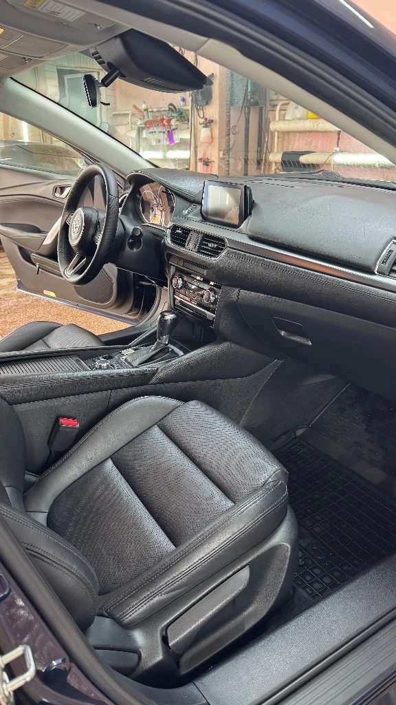 Mazda 6, 2017 — для тех, кто любит драйв и стиль! цена 1 890 000 руб. +79493329833 денис авто в донецке эта mazda 6 создана, чтобы дарить эмоции от каждой поездки. надёжный атмосферный двигатель 2.5 (186 л. с.) в паре с автоматом делает вождение лёгким и уверенным. машина отзывчивая, динамичная и при этом экономичная — идеальный баланс мощности и комфорта. ✨ преимущества: • идеально ухоженное состояние — авто обслуживалось вовремя, без халтуры. • кузов без серьёзных повреждений, салон чистый и аккуратный. • отличная комплектация: мультимедиа, камера заднего вида, двухзонный климат-контроль, бесключевой доступ, датчики слепых зон и многое другое. • приятный расход топлива — около 7–8 л/100 км. mazda 6 — это не просто средство передвижения. это стиль, эмоции и надёжность в одном автомобиле. сел, нажал газ — и почувствовал удовольствие от вождения. 💥 машина не требует вложений — просто садись и наслаждайся! 📍 осмотр в удобное время, звоните или пишите — расскажу всё подробно. - фотография - 7