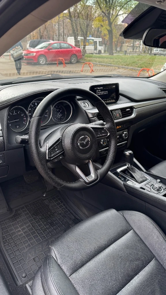 Mazda 6, 2017 — для тех, кто любит драйв и стиль! цена 1 890 000 руб. +79493329833 денис авто в донецке эта mazda 6 создана, чтобы дарить эмоции от каждой поездки. надёжный атмосферный двигатель 2.5 (186 л. с.) в паре с автоматом делает вождение лёгким и уверенным. машина отзывчивая, динамичная и при этом экономичная — идеальный баланс мощности и комфорта. ✨ преимущества: • идеально ухоженное состояние — авто обслуживалось вовремя, без халтуры. • кузов без серьёзных повреждений, салон чистый и аккуратный. • отличная комплектация: мультимедиа, камера заднего вида, двухзонный климат-контроль, бесключевой доступ, датчики слепых зон и многое другое. • приятный расход топлива — около 7–8 л/100 км. mazda 6 — это не просто средство передвижения. это стиль, эмоции и надёжность в одном автомобиле. сел, нажал газ — и почувствовал удовольствие от вождения. 💥 машина не требует вложений — просто садись и наслаждайся! 📍 осмотр в удобное время, звоните или пишите — расскажу всё подробно. - фотография - 2
