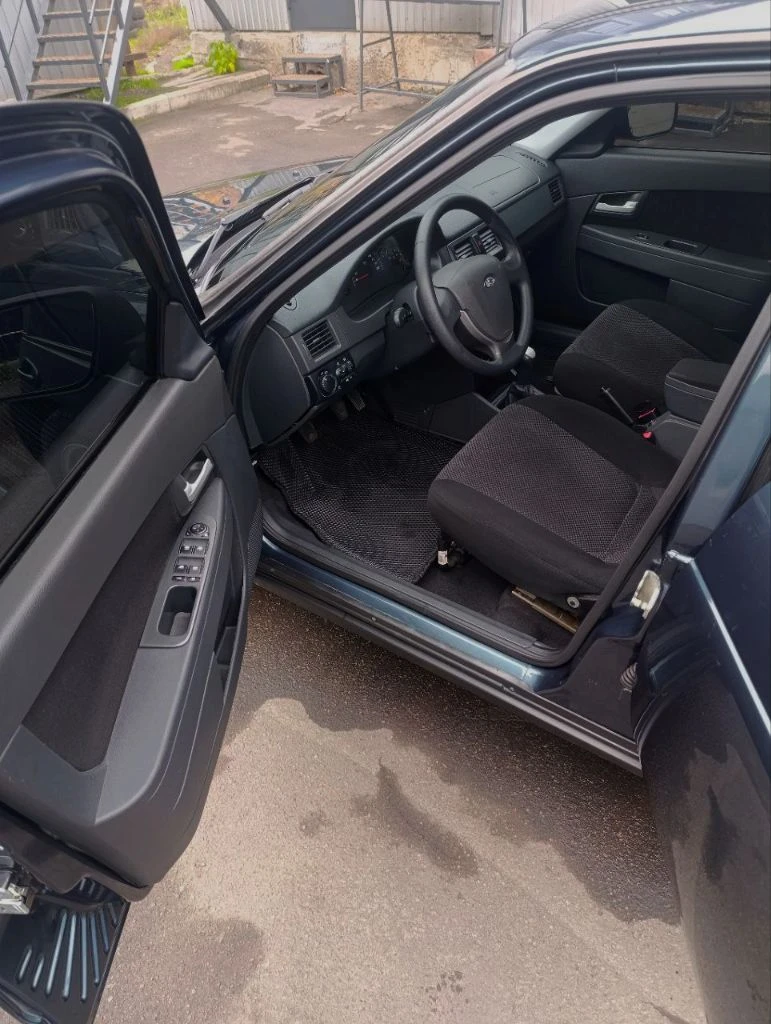 Продам lada priora 2012 года выпуска. я собственник, авто оформлено на меня!пробег 65 000 км родной!!! комплектация люкс! авто полностью обслужено, делать ничего не нужно! недавно были заменяны все жидкости: масло в моторе, масло в коробке, тормозная жидкость, антифриз немецкий хофер! по ходовой авто как мячик, также заменил все резинки, салейнблоки, 4 шруза тоже новые, колодки передние и задние! ремень генератора кондиционера, ремень грм 10тыс назад! под капотом заменяны все прокладки соединений, мотор не троит, не сопит, не течёт, работает всё ровно, гидрики не стучат! мотор родной, как есть, никто в него не лазил, масло от замены до замены! фильтр воздушный, салонный новые! кондёр морозит как надо! в фарах ближний и дальний хорошие леды, туманки линзы свет отличный! по кузову рыжиков нет, оброботона моволью : дно, арки, багажник, двери, капот! керамика 2 слоя! в родном окрасе, цвет "цунами". авто в живую смотриться достойно, лучше чем на фото! продажа по причине покупки другого авто! резина зимняя новоя!!! есть комплект летней, проехал один сезон! сигнализация с автозапуском "starline". любые проверки приветствуются! 650тыс руб. все вопросы по телефону! +79494782672 - фотография - 9