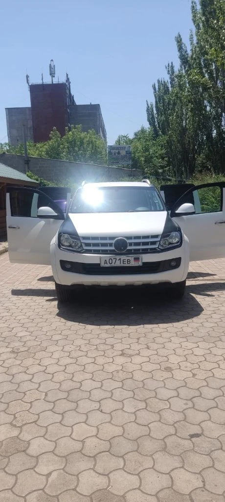 Фольксваген амарок. год выпуска - 2012. объем 2.0 битурбодизель, мкп. пробег 187 000 км. автомобиль был приобретен в 2016 году. по птс - вы будете вторым владельцем. автомобиль на 180 регионе, без штрафов и запретов, любые проверки за ваш счет, переоформление в мрэо. авто в отличном состоянии для своих лет. два года назад полностью обработано днище антикорозийкой. выкрашена в раптор. 50 км назад заменены масла, фильтра, ремни, произведено регламентное то. в дтп не участвовал. дополнительно стоит камера заднего хода, сигнализация "пандора". салон ухоженный и не прокуренный. могу рассмотреть обмен на авто с акп. седаны и лифтбэки, не предлагать. , а также машины старше 2014 года выпуска. разумный торг возле авто реальному покупателю. цена 2200000 рублей. телефон +79495550055. есть телеграмм. - фотография - 8