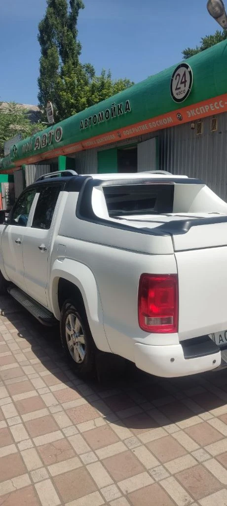 Фольксваген амарок. год выпуска - 2012. объем 2.0 битурбодизель, мкп. пробег 187 000 км. автомобиль был приобретен в 2016 году. по птс - вы будете вторым владельцем. автомобиль на 180 регионе, без штрафов и запретов, любые проверки за ваш счет, переоформление в мрэо. авто в отличном состоянии для своих лет. два года назад полностью обработано днище антикорозийкой. выкрашена в раптор. 50 км назад заменены масла, фильтра, ремни, произведено регламентное то. в дтп не участвовал. дополнительно стоит камера заднего хода, сигнализация "пандора". салон ухоженный и не прокуренный. могу рассмотреть обмен на авто с акп. седаны и лифтбэки, не предлагать. , а также машины старше 2014 года выпуска. разумный торг возле авто реальному покупателю. цена 2200000 рублей. телефон +79495550055. есть телеграмм. - фотография - 7