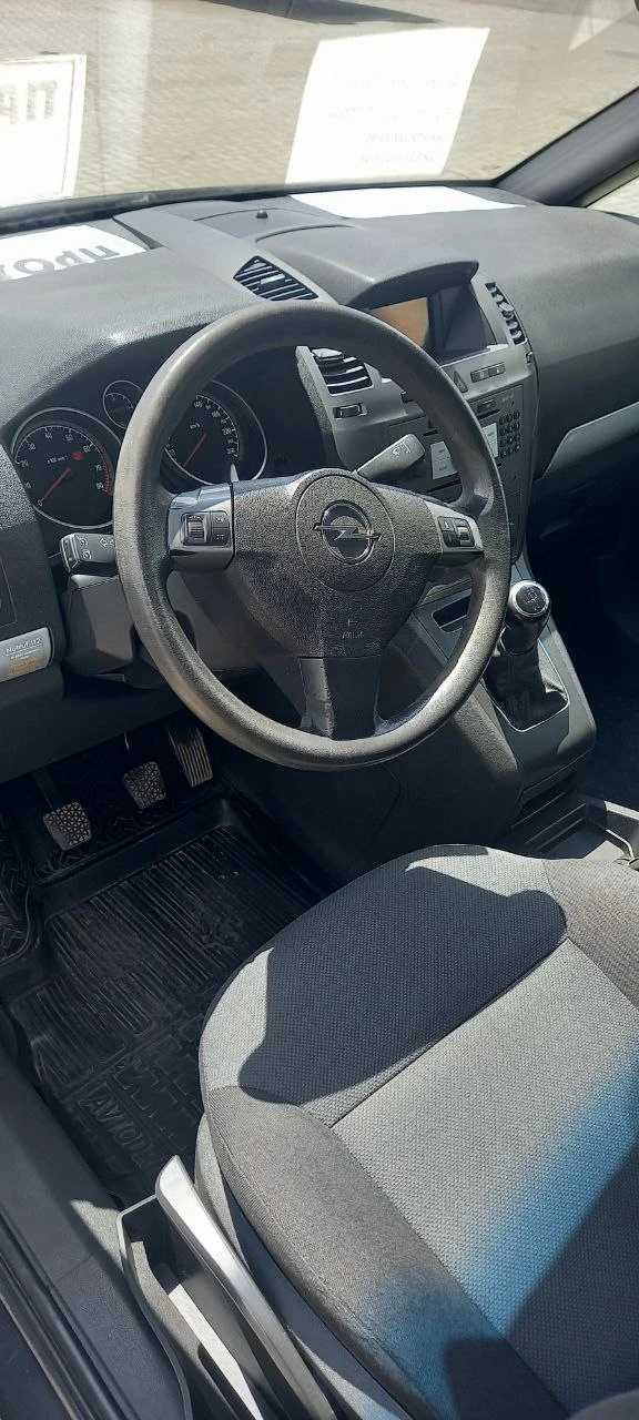 Продам opel zafira b 2007 1.6 (газ метан заводская установка) с пробегом 220000 км. 7 мест. экономный автомобиль в хорошем техническом состоянии, не требующий вложений. цена 650 тыс. руб. +7 949 327 19 90+7 949 305 08 38 г. харцызск - фотография - 12