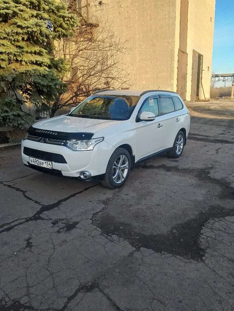 Mitsubishi outlander 2012 г. в. 2.0 акпп. полный привод. цена 1 050 000 руб. возможен торг. осмотр е... - фотография