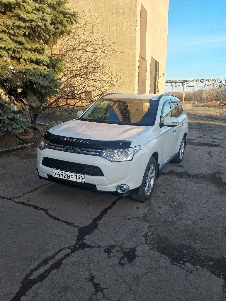 Mitsubishi outlander 2012 г. в. 2.0 акпп. полный привод. цена 1 050 000 руб. возможен торг. осмотр енакиево. - фотография - 2