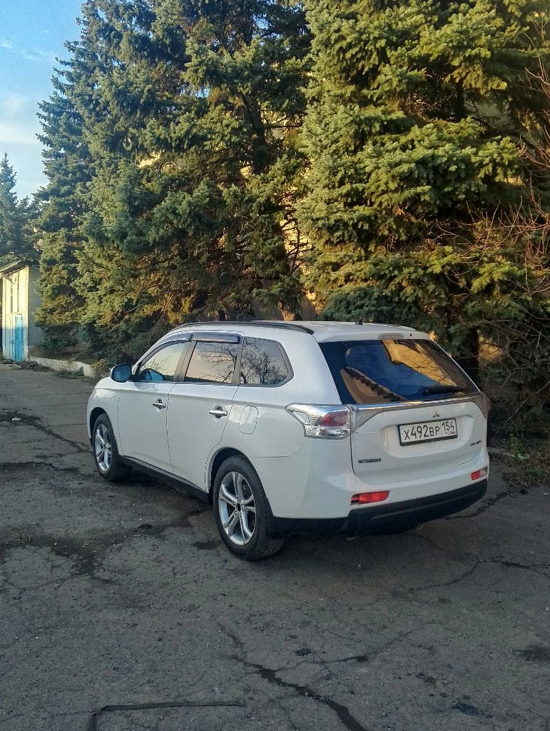 Mitsubishi outlander 2012 г. в. 2.0 акпп. полный привод. цена 1 050 000 руб. возможен торг. осмотр енакиево. - фотография - 3