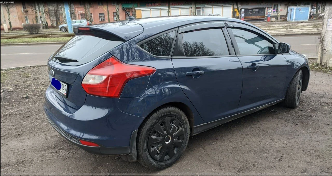 Горловка. продается ford fokus 2014 г. в. двигатель: 1,6 (125 л. с.) коробка передач :механическая тип топлива:бензин автомобиль в родном окрасе, двигатель и коробка передач в отличном состоянии (новые), пробег оригинальный, все документы в порядке. салон чист и опрятен, как новый. автомобиль полностью обслужен и готов к эксплуатации. зеркальный номер в подарок. не упустите возможность приобрести надежный и экономичный автомобиль. все заинтересованные могут связаться для дополнительных вопросов и осмотра. цена: 900000 тел. +7(949) 427-29-91 - фотография - 7