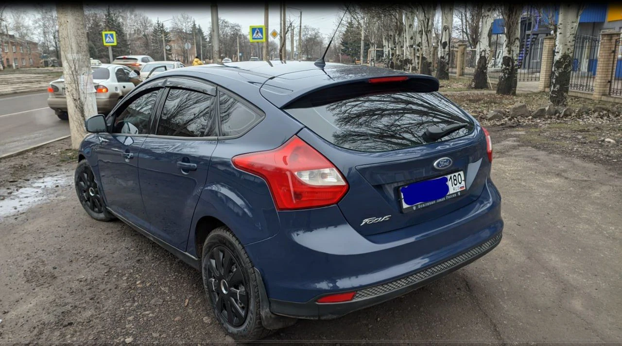 Горловка. продается ford fokus 2014 г. в. двигатель: 1,6 (125 л. с.) коробка передач :механическая тип топлива:бензин автомобиль в родном окрасе, двигатель и коробка передач в отличном состоянии (новые), пробег оригинальный, все документы в порядке. салон чист и опрятен, как новый. автомобиль полностью обслужен и готов к эксплуатации. зеркальный номер в подарок. не упустите возможность приобрести надежный и экономичный автомобиль. все заинтересованные могут связаться для дополнительных вопросов и осмотра. цена: 900000 тел. +7(949) 427-29-91 - фотография - 6