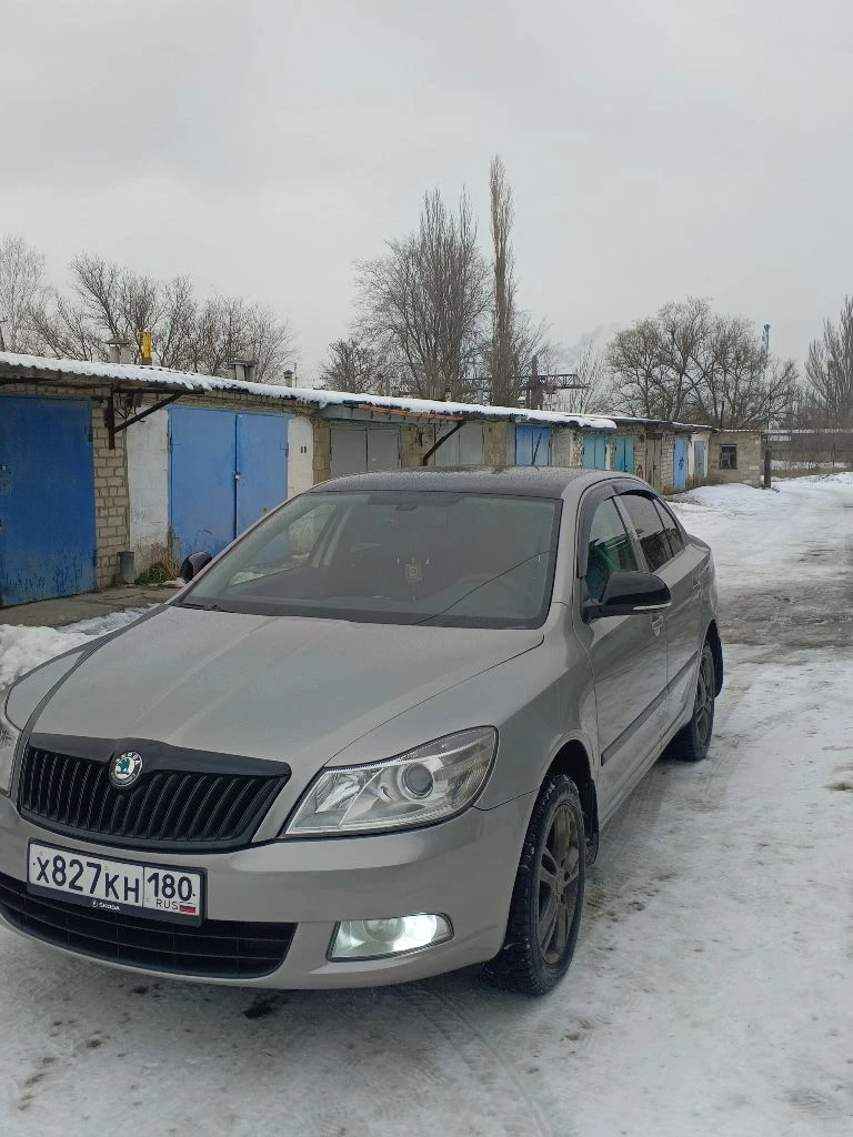 Продам шкоду октавия а5. 2012г. в идеальном состоянии. я хозяин. двигатель1.8 tsi акпп айсин 6-ступ. 152 л. с. пробег 156 тыс. км. мотор, коробка, ходовая все обслужено. опции: подогрев передних сидений, 2х зонный климат контроль, круиз контроль, адаптивный свет, хор. музыка, сигнализация, задний парктроник.2 ключа, 2 комплекта резины, чехлы кожа, сиденья целые под чехлами, установлена защита двигателя, титаны r16. цена 1250000тыс. +торг. другая информация по тел:+79495001387 - фотография - 3