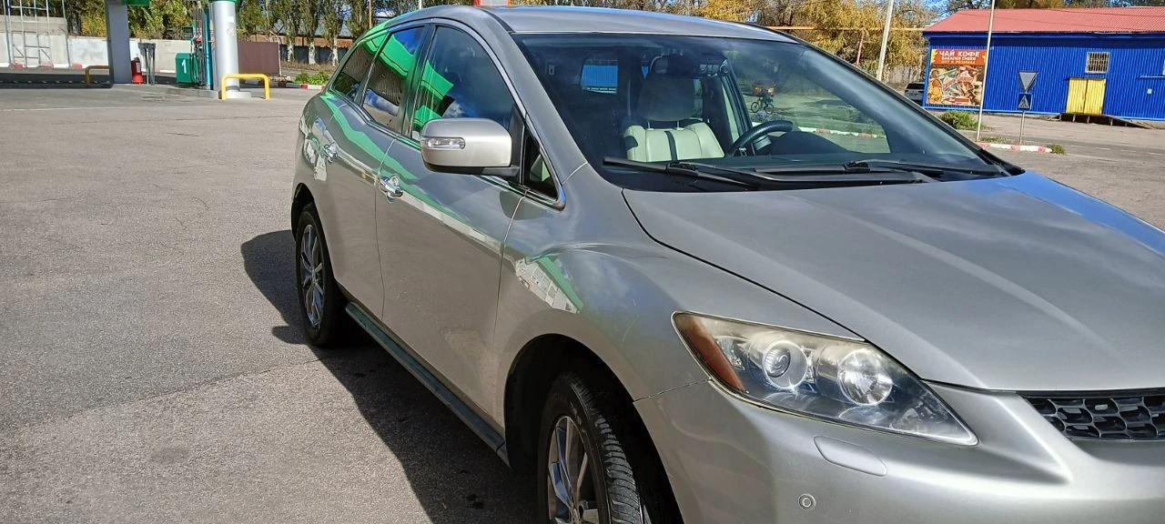 Продам мазда cx-7, мотор 2.3 л, турбо, 248 л. с., 2007 год. максимальная комплектация: кожаный салон, подогревы и электрорегулировка сидений, датчик дождя и света, электрозеркала с подогревом, музыка bose, android магнитола, бесключевой доступ, парктроники. по авто: 1) перебрана ходовая, новые тормозные диски и колодки (заменены в круг); 2) двигатель и коробка работают без нареканий, заменены масла в двигателе и коробке, раздатке, редукторе; 3) заменен компрессор кондиционера (новый) номер для звонков: +79490226487 - фотография - 16