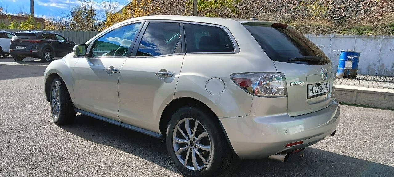 Продам мазда cx-7, мотор 2.3 л, турбо, 248 л. с., 2007 год. максимальная комплектация: кожаный салон, подогревы и электрорегулировка сидений, датчик дождя и света, электрозеркала с подогревом, музыка bose, android магнитола, бесключевой доступ, парктроники. по авто: 1) перебрана ходовая, новые тормозные диски и колодки (заменены в круг); 2) двигатель и коробка работают без нареканий, заменены масла в двигателе и коробке, раздатке, редукторе; 3) заменен компрессор кондиционера (новый) номер для звонков: +79490226487 - фотография - 13