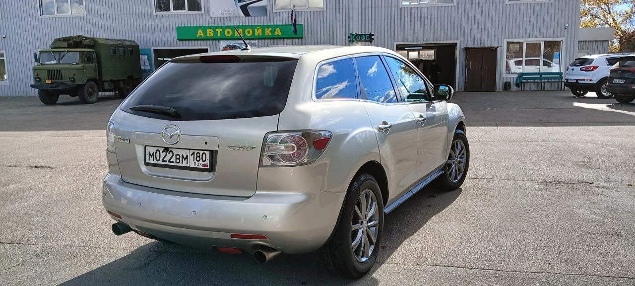 Продам мазда cx-7, мотор 2.3 л, турбо, 248 л. с., 2007 год. максимальная комплектация: кожаный салон, подогревы и электрорегулировка сидений, датчик дождя и света, электрозеркала с подогревом, музыка bose, android магнитола, бесключевой доступ, парктроники. по авто: 1) перебрана ходовая, новые тормозные диски и колодки (заменены в круг); 2) двигатель и коробка работают без нареканий, заменены масла в двигателе и коробке, раздатке, редукторе; 3) заменен компрессор кондиционера (новый) номер для звонков: +79490226487 - фотография - 10