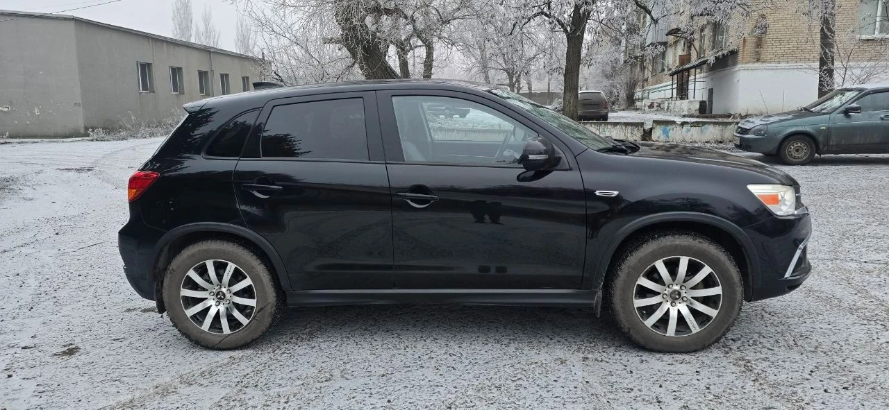 🚗 mitsubishi outlander sport, 2019 г. ! продаю надежный и ухоженный автомобиль в отличном техническом и внешнем состоянии. 🔹 двигатель: 2.0 бензин 🔹 привод: полный (awd) — уверенно едет в любую погоду 🔹 пробег: всего 48 000 км (родной) 🔹 год выпуска: 2019 ✅ автомобиль полностью обслужен, все то по регламенту ✅ без вложений — сел и поехал ✅ новая резина ✅ чистый, аккуратный салон ✅ я собственник, документы в порядке 📹 видео автомобиля — по запросу осмотр. петровское. красный луч. 💰 цена: 1 800 000 ₽ 📞 готов ответить на все вопросы, дополнительная информация по телефону 📲 телефон / telegram: +7 959 200 51 78 - фотография - 7