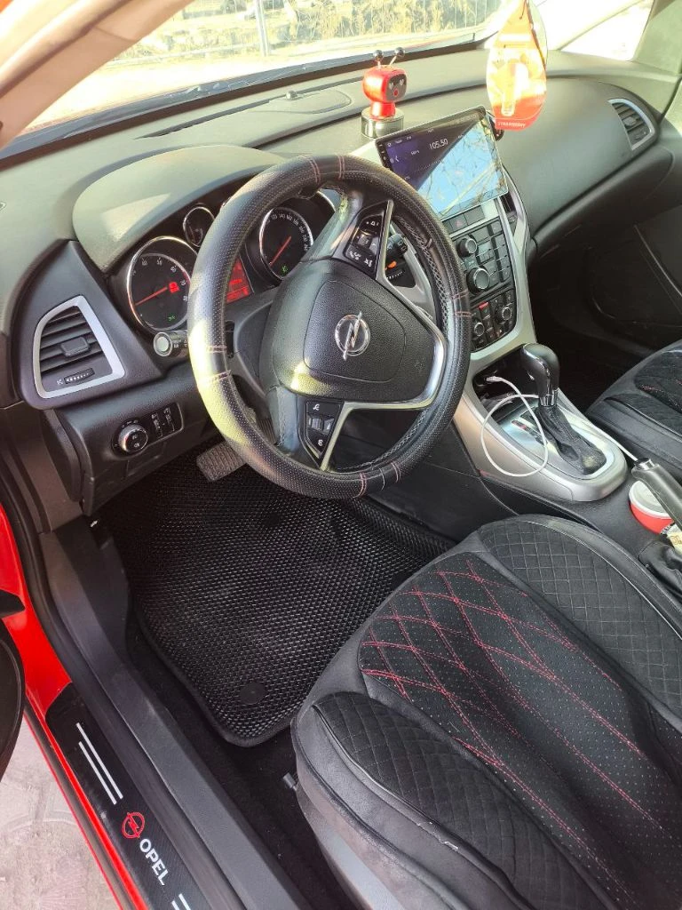 Продам opel astra j 2011г. в. мотор 1,4 турбо, бензин. автомат. пробег 156 тыс. км. два комплекта колес, автозапуск, турботаймер, мультируль, круиз, обогрев сидений, обогрев зеркал и стекол, камера заднего вида, андроид магнитола, парктроники, двухзонный климат, атермальное остекление, люк, датчик движения в салоне. автомобиль полностью обслужен! я хозяин, с документами полный порядок цена 810 тыс+ небольшой торг макеевка +79493779511 - фотография - 5