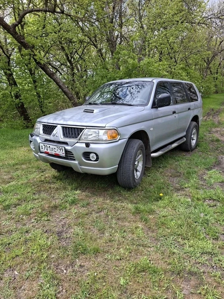 Продаю mitsubishi pajero sport 🚗 модель: mitsubishi pajero sport (серебристый). 📅 год выпуска: 2008 🔧 тип двигателя: дизель 🏎️ коробка передач: механика 🌏 привод: полный. 📏 клиренс: 215 мм — отлично подходит для бездорожья! 💺 места: 5. в хорошем состоянии, без серьёзных повреждений, двигатель работает ровно, ходовая часть в порядке. все системы работают исправно (электрооборудование, аудиосистема). три комплекта колёс, зимняя и летняя на дисках. есть все нужные документы. тех осмотр пройден. больше информации по телефону : +79493078284 виктор цена: 1000000 докучаевск - фотография - 5